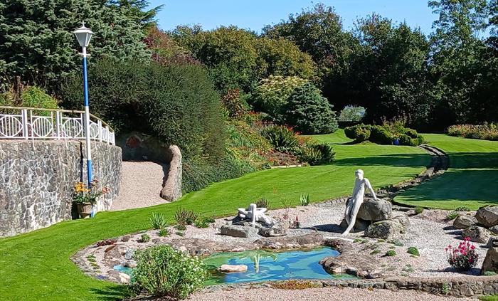 view from house with Grotto wall on lt.